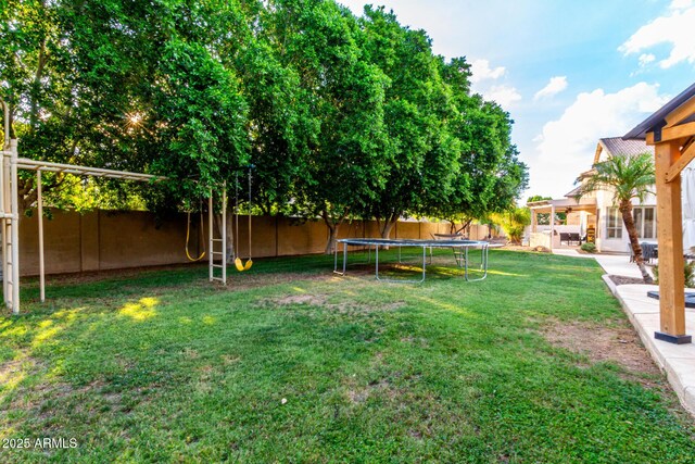 7029 E Monte Cir, Mesa, AZ 85209 - view of yard with a trampoline