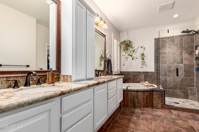 7029 E Monte Cir, Mesa, AZ 85209 - full bath with a stall shower, double vanity, a garden tub, recessed lighting, and stone finish flooring