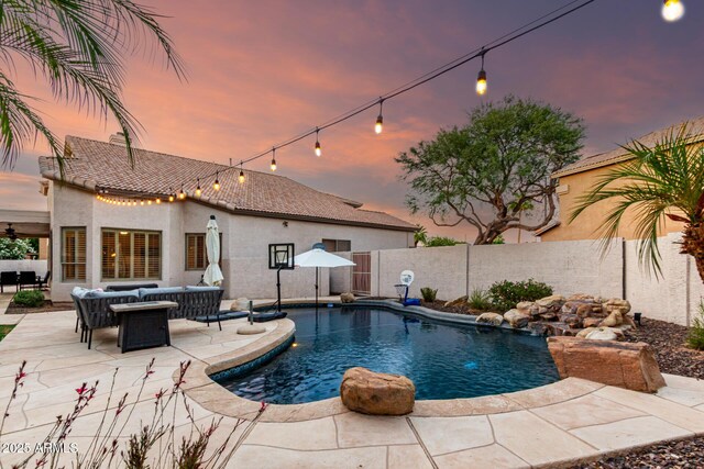7029 E Monte Cir, Mesa, AZ 85209 - view of swimming pool featuring an outdoor hangout area, a fenced backyard, and a patio