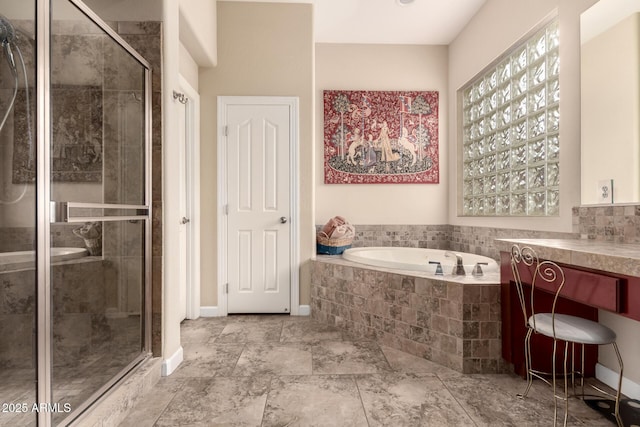 20532 W Summit Pl, Buckeye, AZ 85396 - bathroom featuring a bath, a shower stall, and baseboards