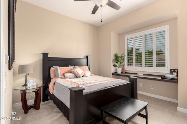 20532 W Summit Pl, Buckeye, AZ 85396 - bedroom with light tile patterned floors, baseboards, and ceiling fan
