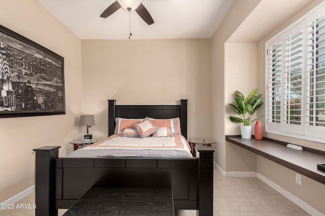 20532 W Summit Pl, Buckeye, AZ 85396 - bedroom featuring baseboards, light tile patterned floors, and ceiling fan