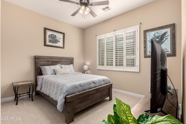 20532 W Summit Pl, Buckeye, AZ 85396 - bedroom with baseboards, light tile patterned flooring, and a ceiling fan