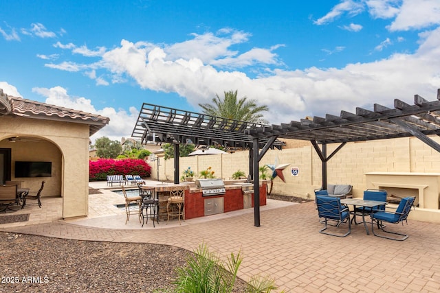 20532 W Summit Pl, Buckeye, AZ 85396 - view of patio featuring a fireplace, a pergola, and outdoor dining area