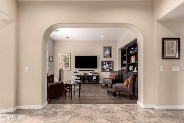 20532 W Summit Pl, Buckeye, AZ 85396 - living room with arched walkways and baseboards
