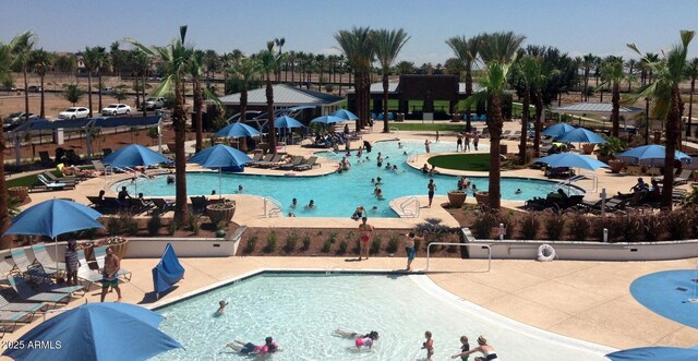 20532 W Summit Pl, Buckeye, AZ 85396 - community pool featuring a patio