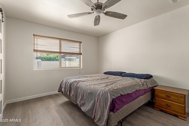 2826 E Cactus Rd, Phoenix, AZ 85032 - bedroom with wood finished floors and ceiling fan