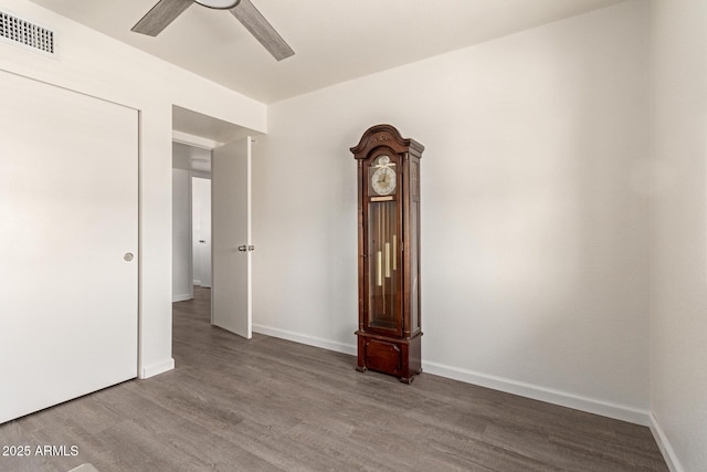 2826 E Cactus Rd, Phoenix, AZ 85032 - spare room with a ceiling fan and wood finished floors