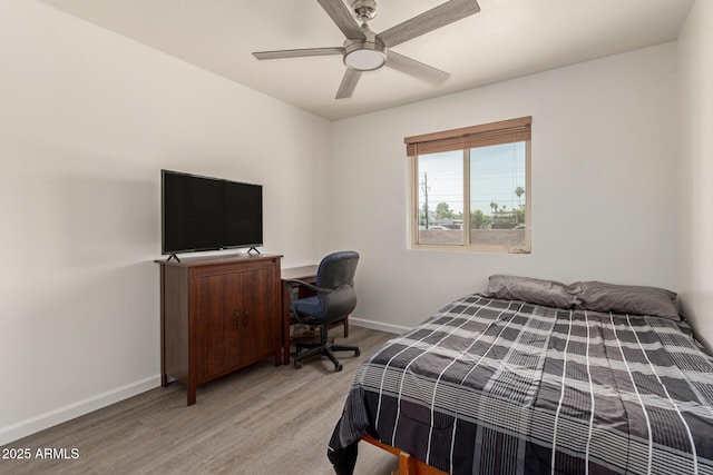 2826 E Cactus Rd, Phoenix, AZ 85032 - bedroom with light wood finished floors and ceiling fan