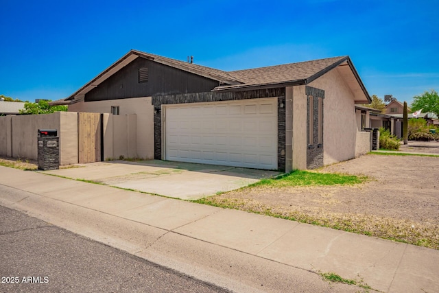 2826 E Cactus Rd, Phoenix, AZ 85032 - view of front of property with an attached garage and concrete driveway