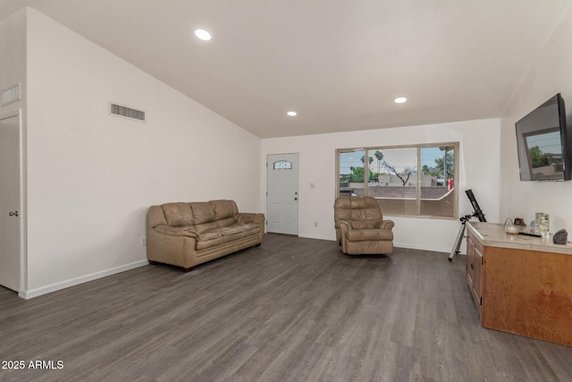 2826 E Cactus Rd, Phoenix, AZ 85032 - living area featuring dark wood-type flooring, recessed lighting, and lofted ceiling