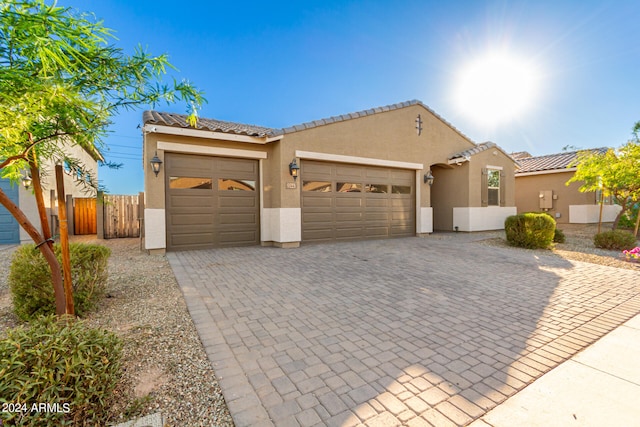 view of front of property featuring a garage