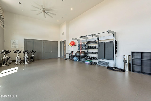 garage with visible vents and a ceiling fan