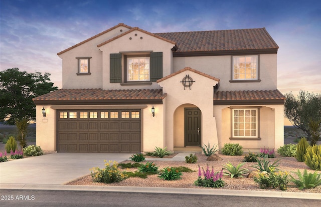 mediterranean / spanish home featuring a tile roof, driveway, an attached garage, and stucco siding