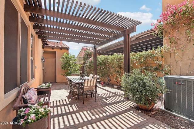 view of patio featuring a pergola and central AC unit