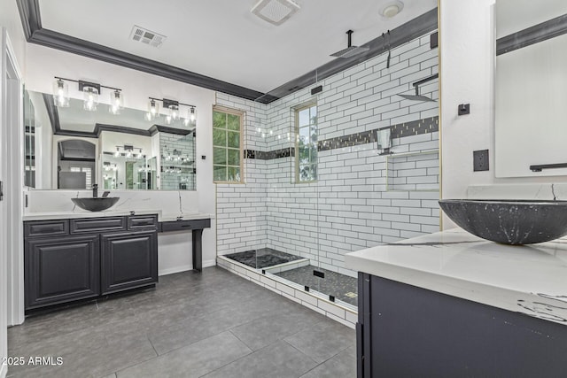 20689 W Valley View Dr, Buckeye, AZ 85396 - full bathroom featuring a stall shower, two vanities, tile patterned flooring, and crown molding