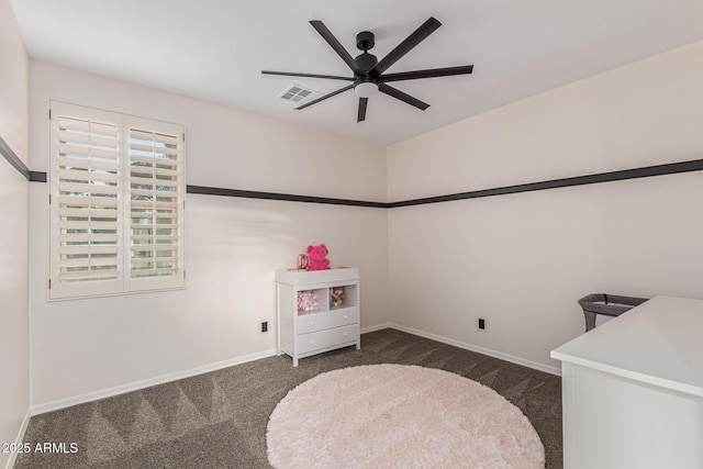 20689 W Valley View Dr, Buckeye, AZ 85396 - bedroom featuring dark colored carpet, baseboards, and ceiling fan