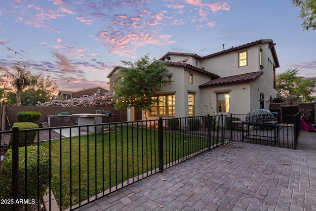 20689 W Valley View Dr, Buckeye, AZ 85396 - back of property with stucco siding, a patio, and a tile roof