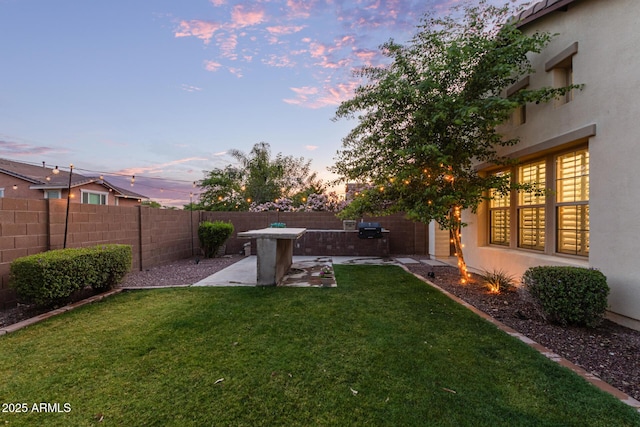 20689 W Valley View Dr, Buckeye, AZ 85396 - yard at dusk with a patio area