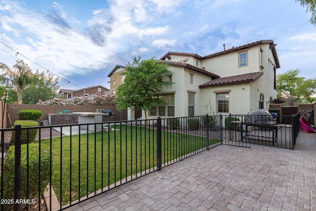 20689 W Valley View Dr, Buckeye, AZ 85396 - back of property featuring stucco siding, a patio area, and a tile roof