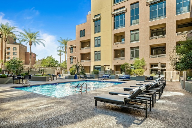 view of pool featuring a patio