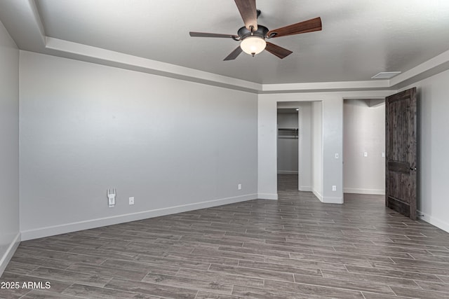 6397 E Red Oak Cir, Hereford, AZ 85615 - unfurnished bedroom featuring baseboards, ceiling fan, wood finished floors, and visible vents
