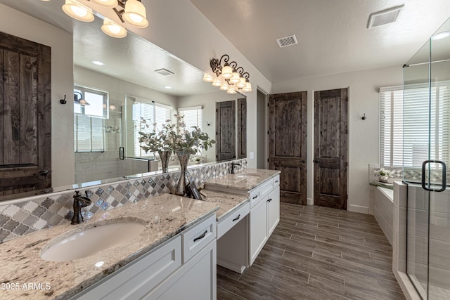 6397 E Red Oak Cir, Hereford, AZ 85615 - full bathroom featuring visible vents, a sink, and a stall shower