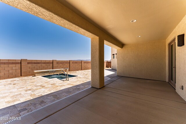 6397 E Red Oak Cir, Hereford, AZ 85615 - view of patio featuring a fenced backyard and an in ground hot tub
