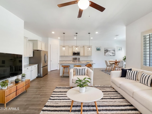 10559 E Simone Ave, Mesa, AZ 85212 - living area featuring a ceiling fan, dark wood finished floors, and recessed lighting