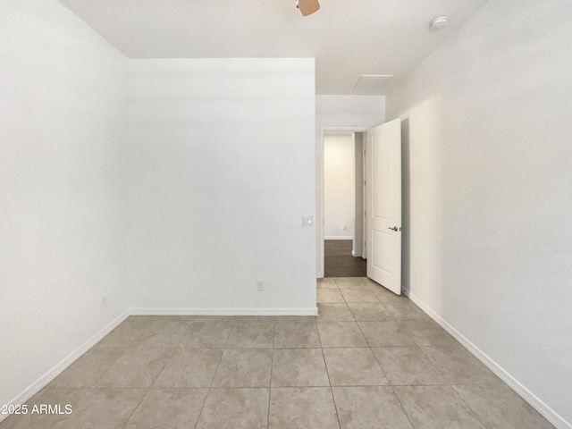 10559 E Simone Ave, Mesa, AZ 85212 - unfurnished room with light tile patterned flooring and a smoke detector