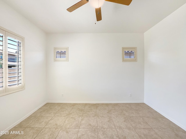10559 E Simone Ave, Mesa, AZ 85212 - empty room with a ceiling fan and light tile patterned flooring