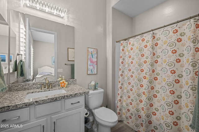 5250 S Wesley Cir, Mesa, AZ 85212 - bathroom featuring vanity, toilet, curtained shower, and wood finished floors
