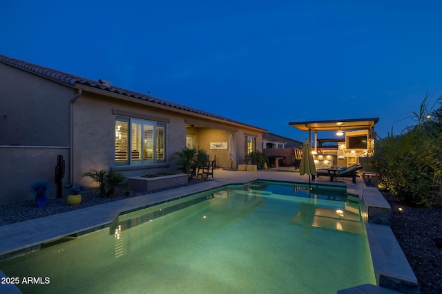 5250 S Wesley Cir, Mesa, AZ 85212 - pool at twilight featuring an outdoor pool and a patio