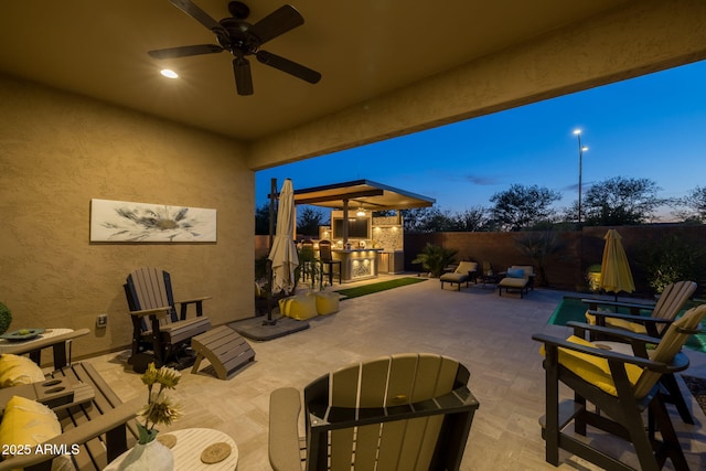 5250 S Wesley Cir, Mesa, AZ 85212 - fenced backyard featuring a ceiling fan and a patio area