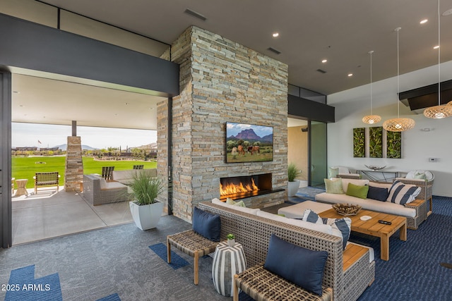 5250 S Wesley Cir, Mesa, AZ 85212 - living room featuring carpet flooring, an outdoor stone fireplace, recessed lighting, and a towering ceiling
