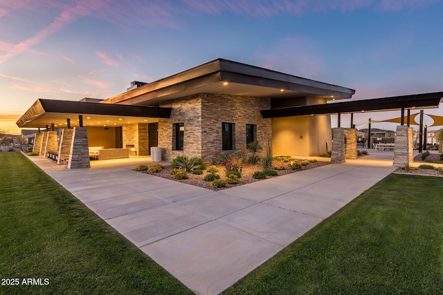 5250 S Wesley Cir, Mesa, AZ 85212 - back of property featuring a yard and stone siding