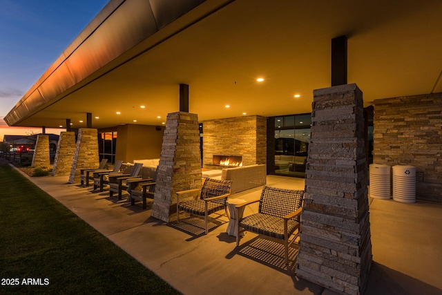 5250 S Wesley Cir, Mesa, AZ 85212 - view of patio / terrace with an outdoor stone fireplace