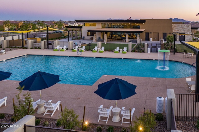 5250 S Wesley Cir, Mesa, AZ 85212 - pool at dusk with a community pool and a patio