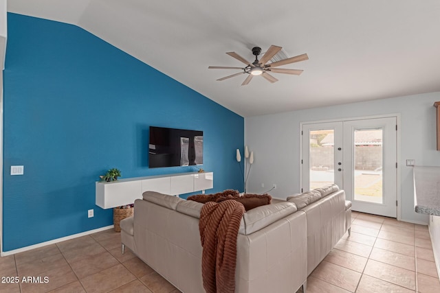 living room featuring ceiling fan, tile patterned floors, lofted ceiling, and french doors