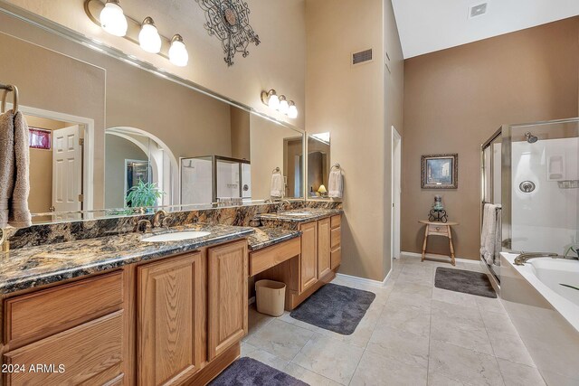 bathroom featuring vanity and ceiling fan