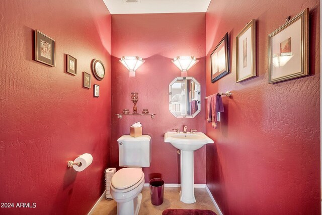 bathroom featuring plus walk in shower, a notable chandelier, high vaulted ceiling, and vanity