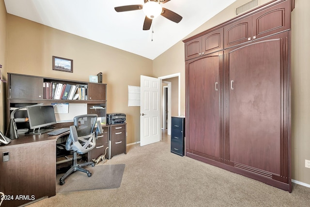 office space featuring light carpet, vaulted ceiling, and ceiling fan