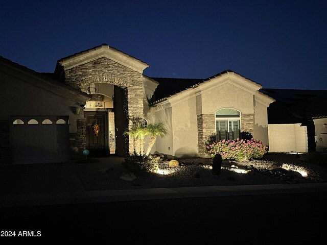 view of front of house with a garage