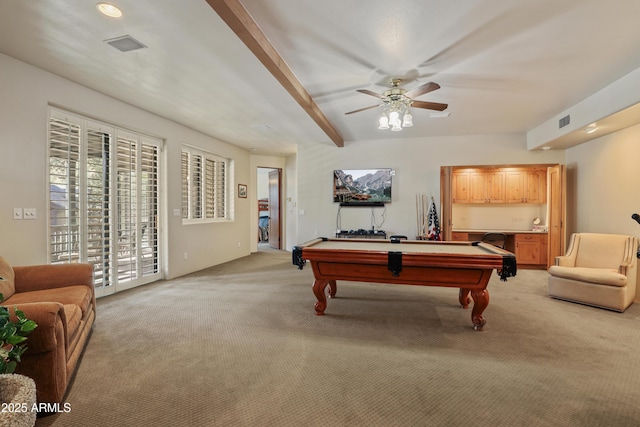 recreation room featuring beamed ceiling, ceiling fan, light colored carpet, and billiards