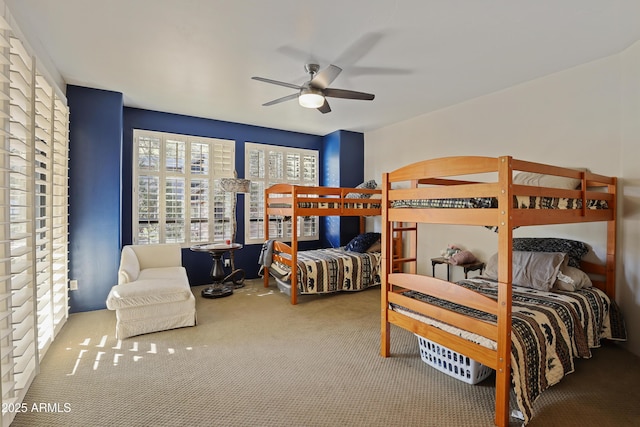 bedroom featuring ceiling fan and carpet floors