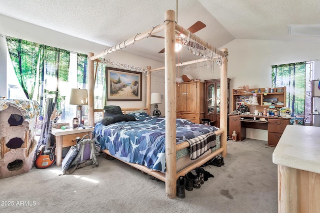 bedroom featuring lofted ceiling, multiple windows, and light carpet