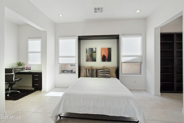 bedroom with light tile patterned floors, baseboards, visible vents, and recessed lighting