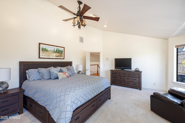 carpeted bedroom with lofted ceiling and ceiling fan