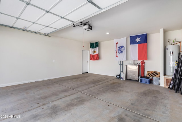 garage featuring water heater and a garage door opener