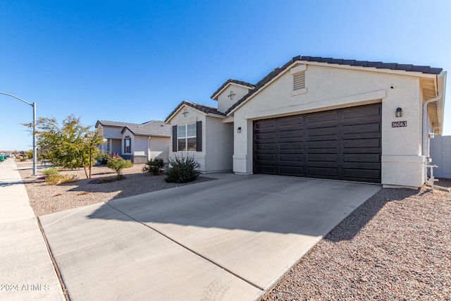 ranch-style house with a garage